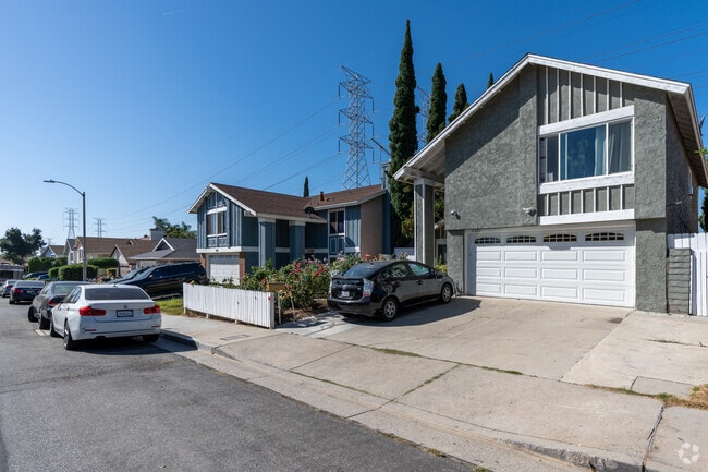 Mission Hills features homes with a mix of wood trim and stucco facades.