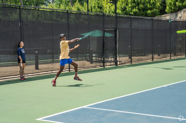 Residents in Memorial Park often go to Bitsy Grant Tennis Center to train and for fun.