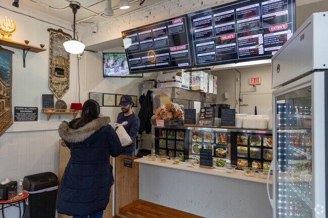 Shamis Wraps offers authentic Syrian dishes in the Charles neighborhood.