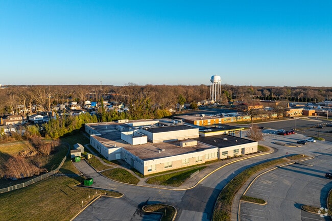 The Brennen School emphasizes teaching in community and natural environments.