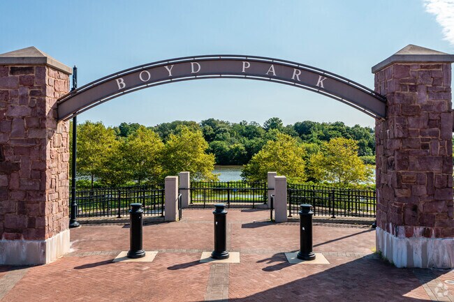 The archway of Boyd Park welcomes visitors to an oasis of greenery in New Brunswick, NJ.