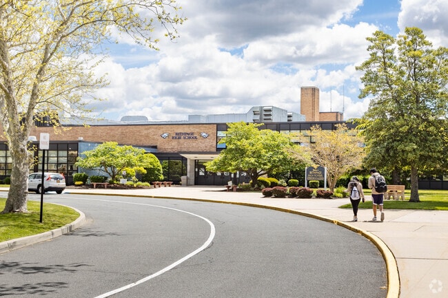 The main entrance to the Bethpage High School in Bethpage, NY has a circular driveway.