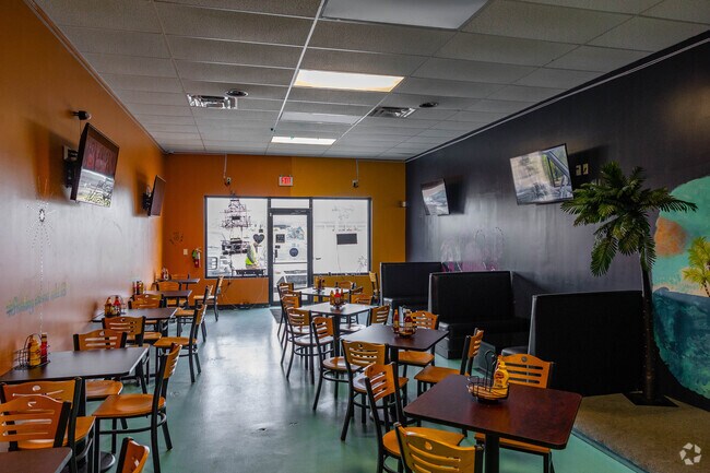 Grab a signature cocktail at Floating Island Bakery and Cafe in Read Blvd West.