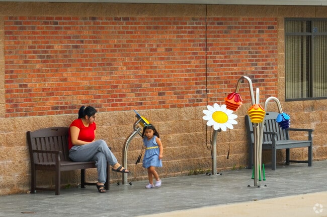 The Dodge Center Public Library has a few benches outside of its facility.