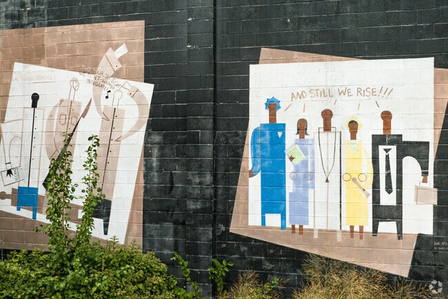 A mural in Harlem Park exclaims: 