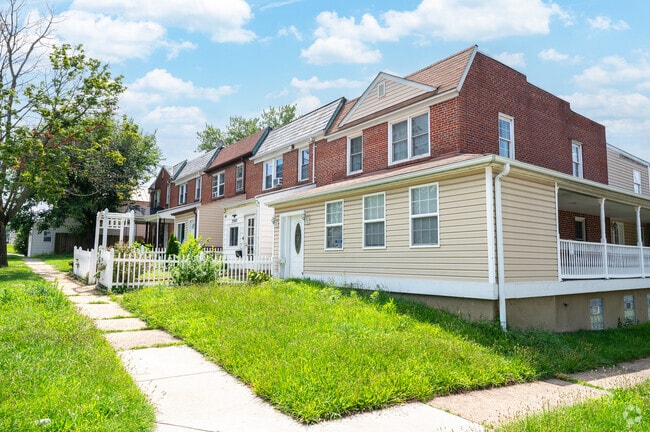 Attached red brick homes are common in Brooklyn, MD.
