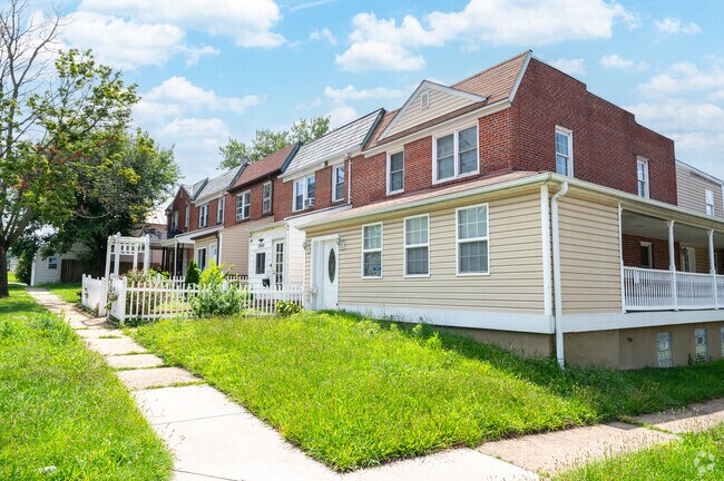 Attached red brick homes are common in Brooklyn, MD.