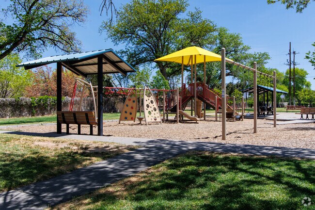 Burton Park has a great playground for local kids to enjoy nearby the Southeast Heights neighborhood.