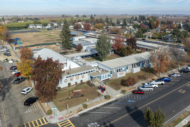 Colorful trees surround Fremont Elementary School in Fowler.