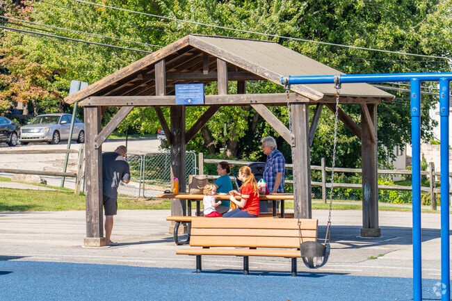 Families gather at the pavilion at Saint Gert's park in West Conshohocken.
