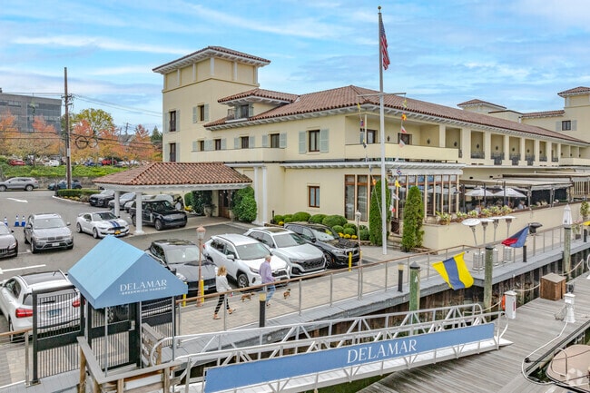 The Delamar Hotel and L'Escale Restaurant are located at the northern end of Greenwich Harbor.