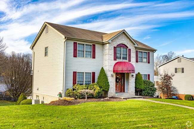 The spacious yard of this newer home gives it some privacy compared to others in Delmont.