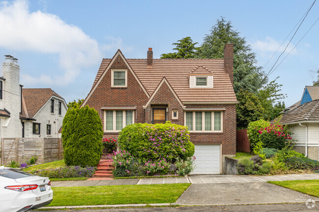 Homes in Madrona are often well maintained with manicured front yards and lush greenery.