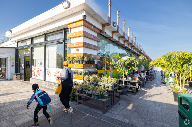 Bello Poultry Market in Holtsville becomes a scene outside with its inviting gathering spots.