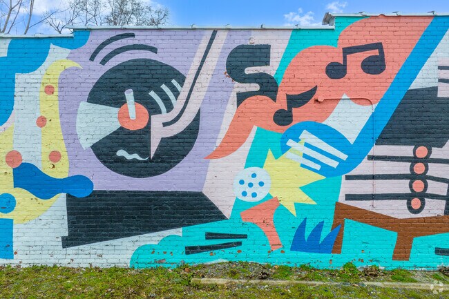 Hawthorne Park has many murals and public artworks visible from the street.