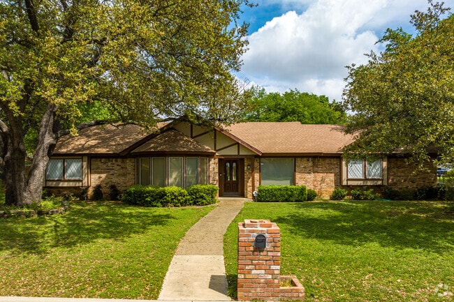 Tucked behind mature trees are charming homes with plenty of character in Edgecliff Village.