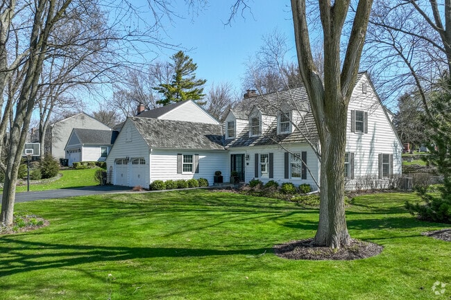 Rustic farmhouse style homes with shutters can be found within Barrington Hills.