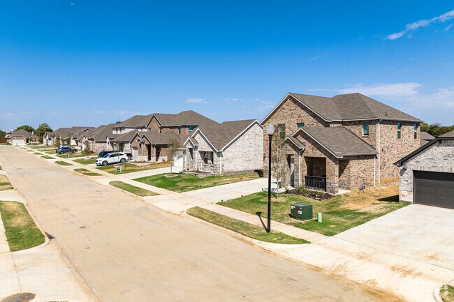 Traditional brick homes are a common type of house in Lake Dallas, Texas.