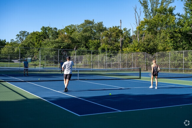 Play some tennis with friends in Lucille Park.