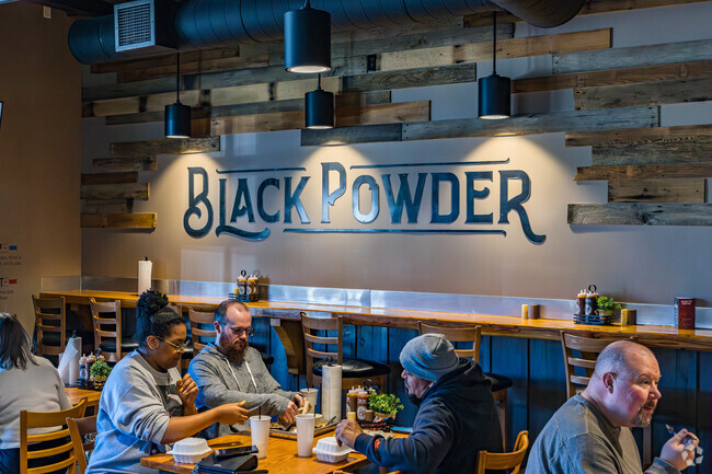 Friends from Hickswood savor lunch at the Black Powder Smokehouse.
