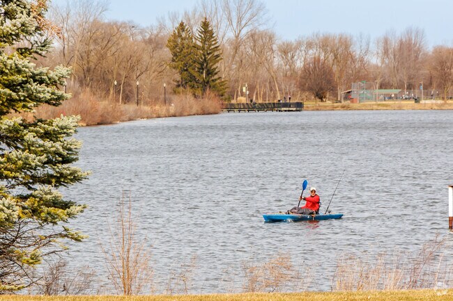 Residents of West Hawnthorn Hills enjoy kayaking on a warm and sunny day.