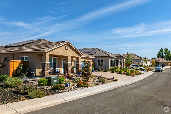 Spanish architecture adds variety alongside ranch‑style homes in Lone.