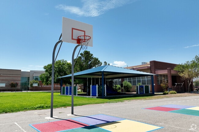 Aoy Elementary School has a playground with basketball, four square, hopscotch and more.