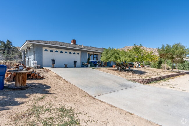 Ranch-style homes with drought-resistant landscaping is common in Lake Los Angeles.