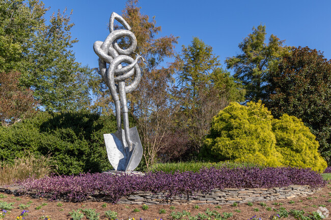 The sculpture Intertwind welcomes visitors to the Norfolk Botanical Gardens, close to Elmhurst.