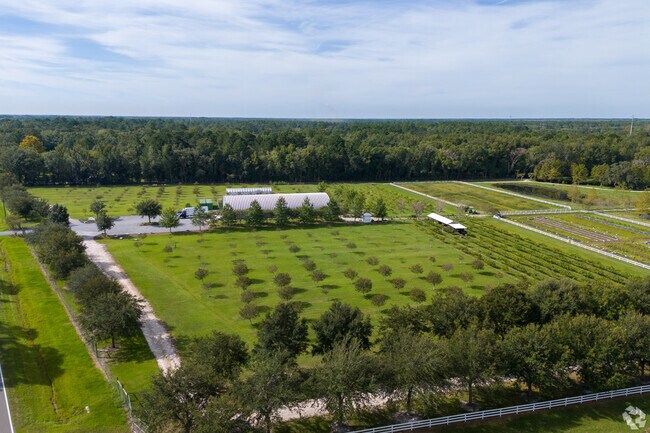 There are many farms close to Forest Trails.