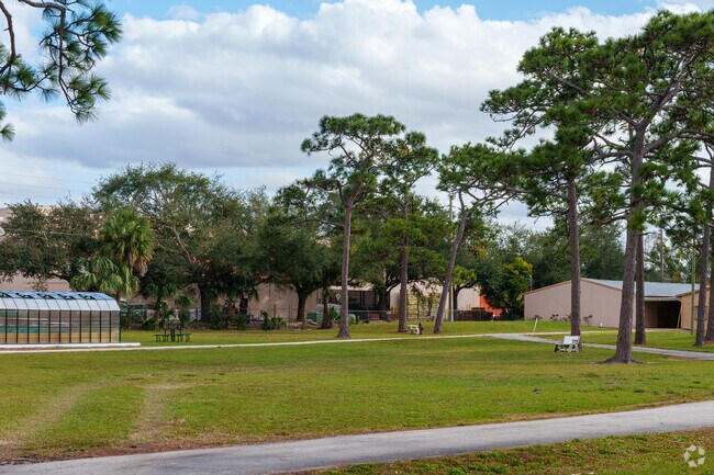 Access Charter School features a large open grass area inviting kids to explore.