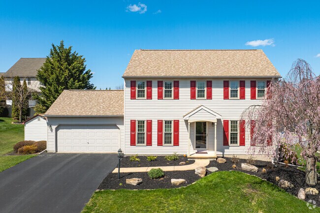 Colonial home owners in Loganville take pride in their pristine landscaping.