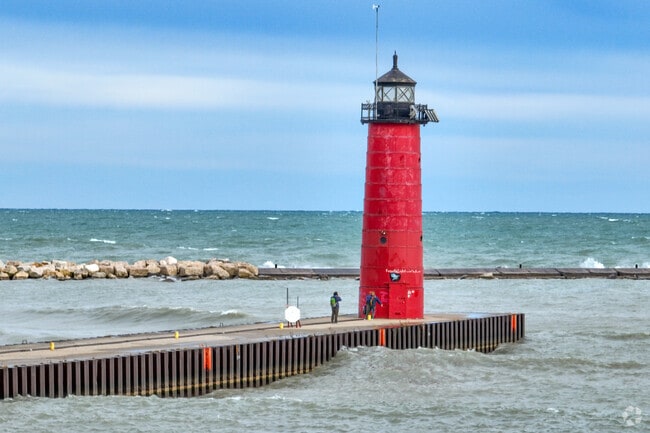 Residents of downtown Kenosha enjoy taking photos in front of the Kenosha Lighthouse.