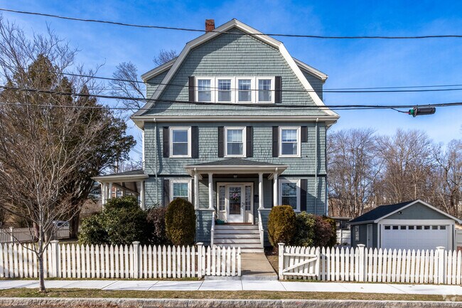 This brilliant green home has ample space for off street parking.