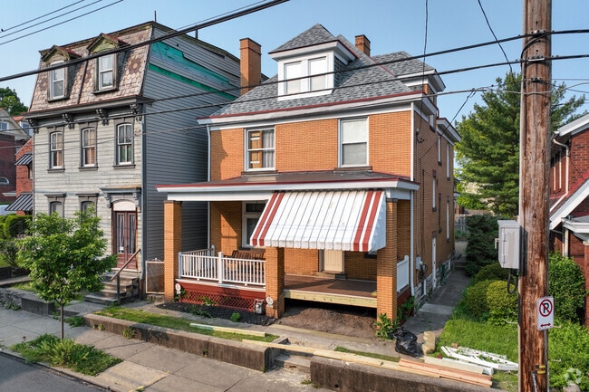 A lovely four-square home sits in the Troy Hill neighborhood.