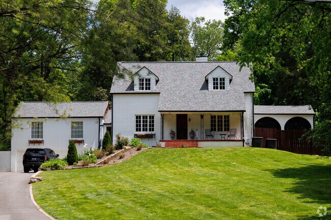 Painted brick homes with spacious front yards are a hallmark of Chilhowee Hills.