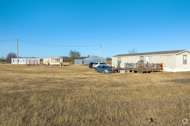 Corbett offers trailers that sit on large lots.