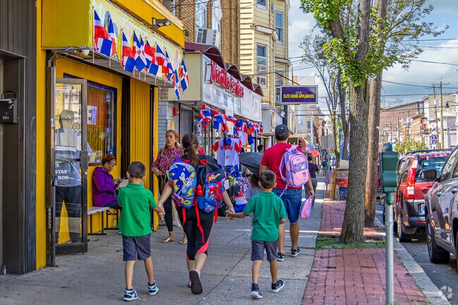 The streets of Eastside are filled with residents on warm summer days.