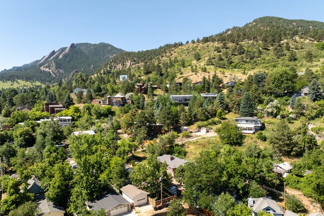 Live among the rolling hills and forests of University Hill.