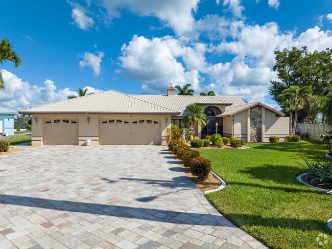 Larger waterfront homes with multi-car garages are common in Hancock, Cape Coral.