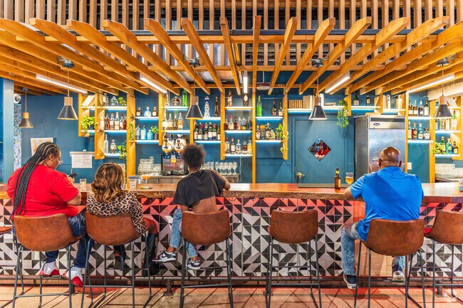 Grab a drink with friends at the bar at The Citadel in Little River, FL.