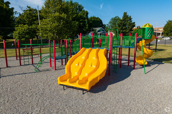 East Syracuse Elementary School has a playground and other outdoor activities for students.