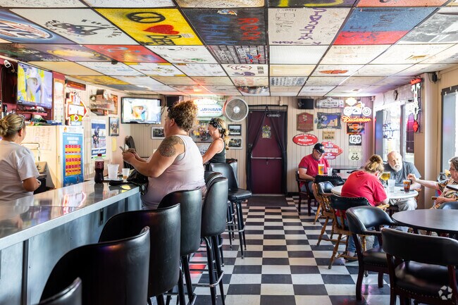 The Spot is a local bar in Quinton Heights and has many wonderful patrons and stories.