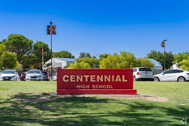 A large sign welcomes students to Centennial High School in Bakersfield.