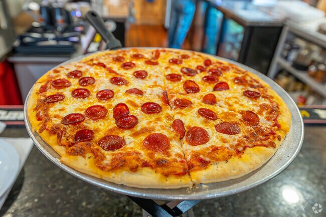 Enjoy a fresh slice of pizza at Mario's while in Trenton.