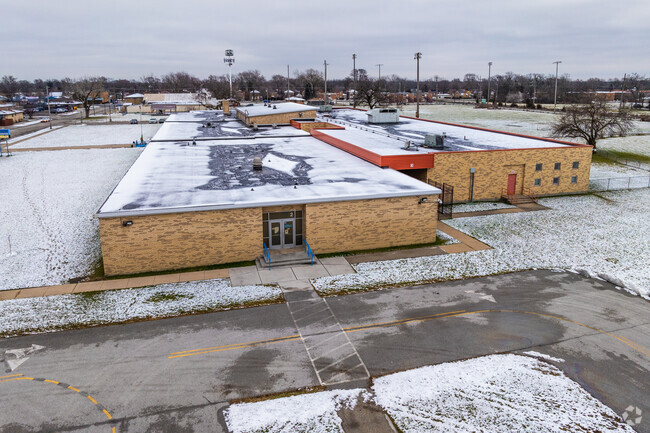 Holmes Elementary School features a yellow brick design.