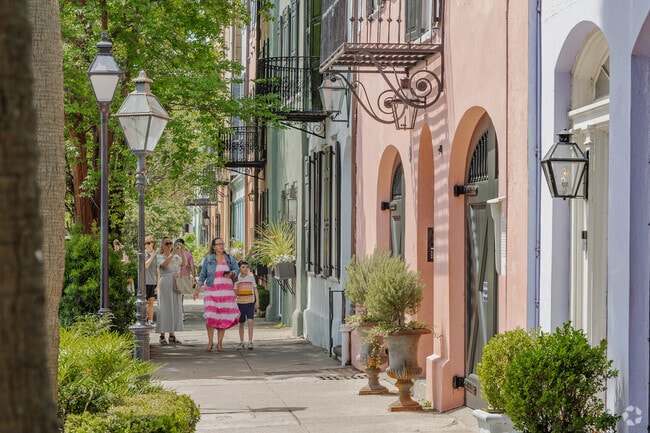 Rainbow Row is a popular spot to walk with a row of colorful historic homes in Charlestowne.
