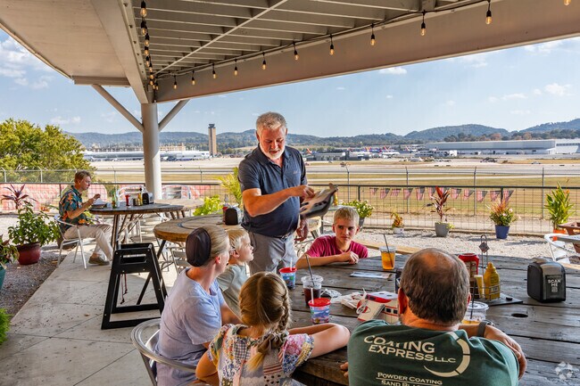 Alpha Charlie is a cool restaurant where you can watch planes take off near Zion City.