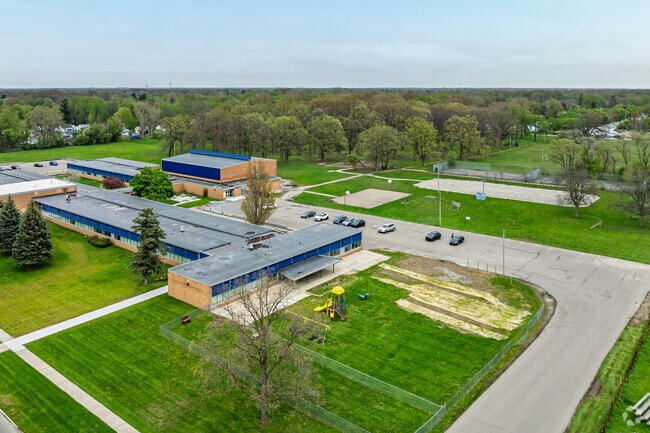 Potter School features a large play area behind the school for student recess.