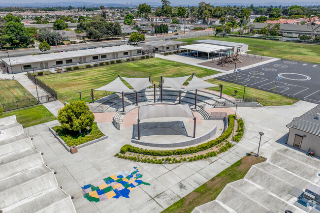 An outdoor seating area hosts performances at Holder Elementary.